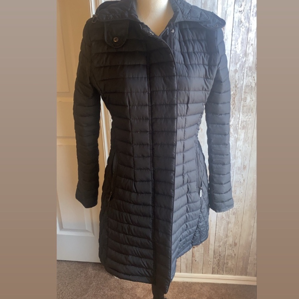 Small women’s black quilted coat